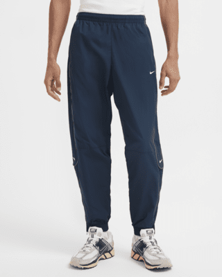 Nike shell suit bottoms online